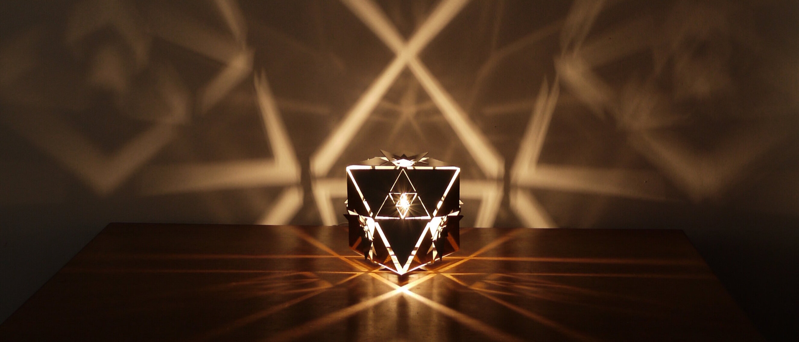Octahedron Platonic Solid Lamp: Air (Rotated View)
Alternate rotated view of KAGE's Octahedron Platonic Solid Lamp, emphasizing the shimmering high-gloss polished stainless steel and design symbolizing the Air element.