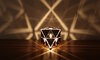 Alternate rotated view of KAGE's Octahedron Platonic Solid Lamp, emphasizing the shimmering high-gloss polished stainless steel and design symbolizing the Air element.