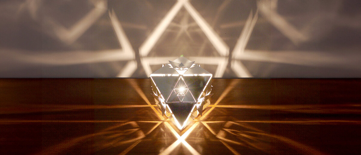 Octahedron Platonic Solid Lamp: Air (Front View)
Front view of KAGE's high-gloss polished stainless steel Octahedron Platonic Solid Lamp symbolizing the Air element.