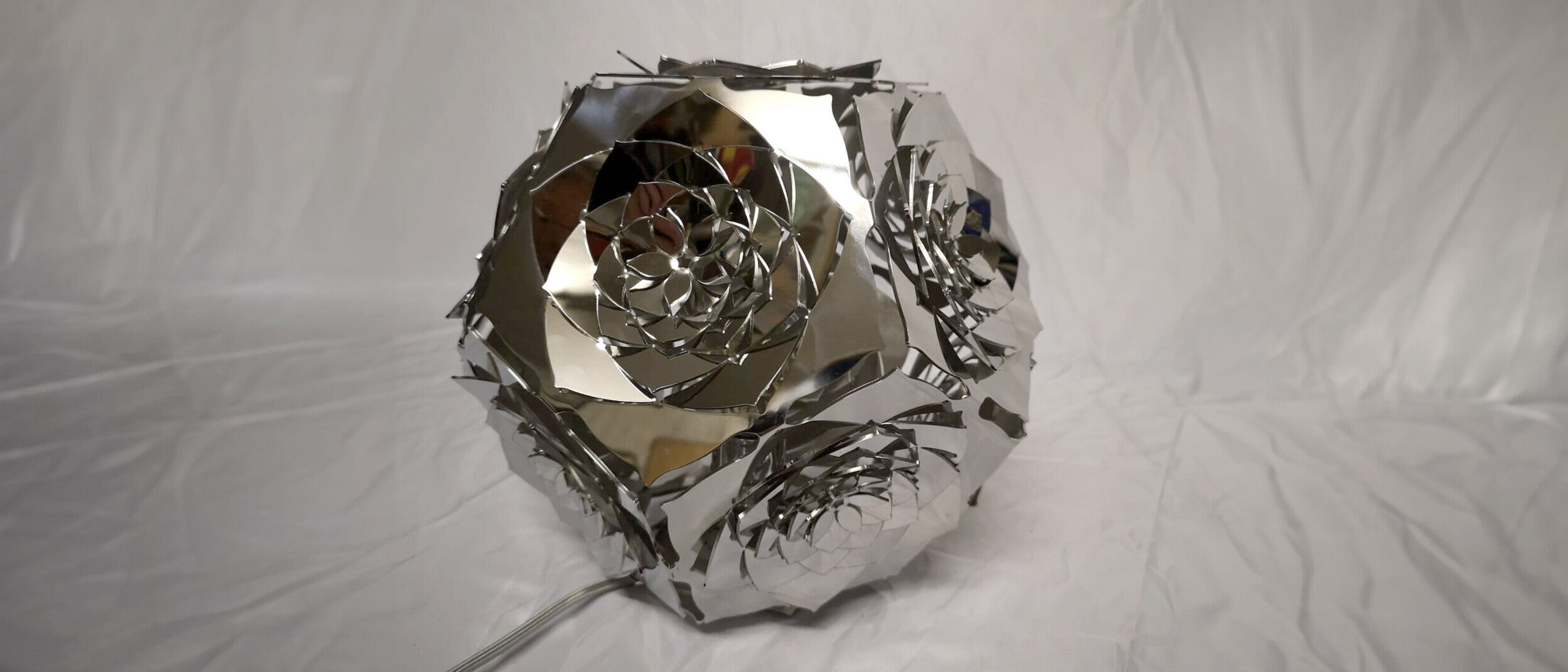 Dodecahedron Platonic Solid Sculpture: The Moon (Natural Light)
Close-up of KAGE's "The Moon", a stainless steel dodecahedron sculpture, reflecting the serene beauty of lunar patterns.