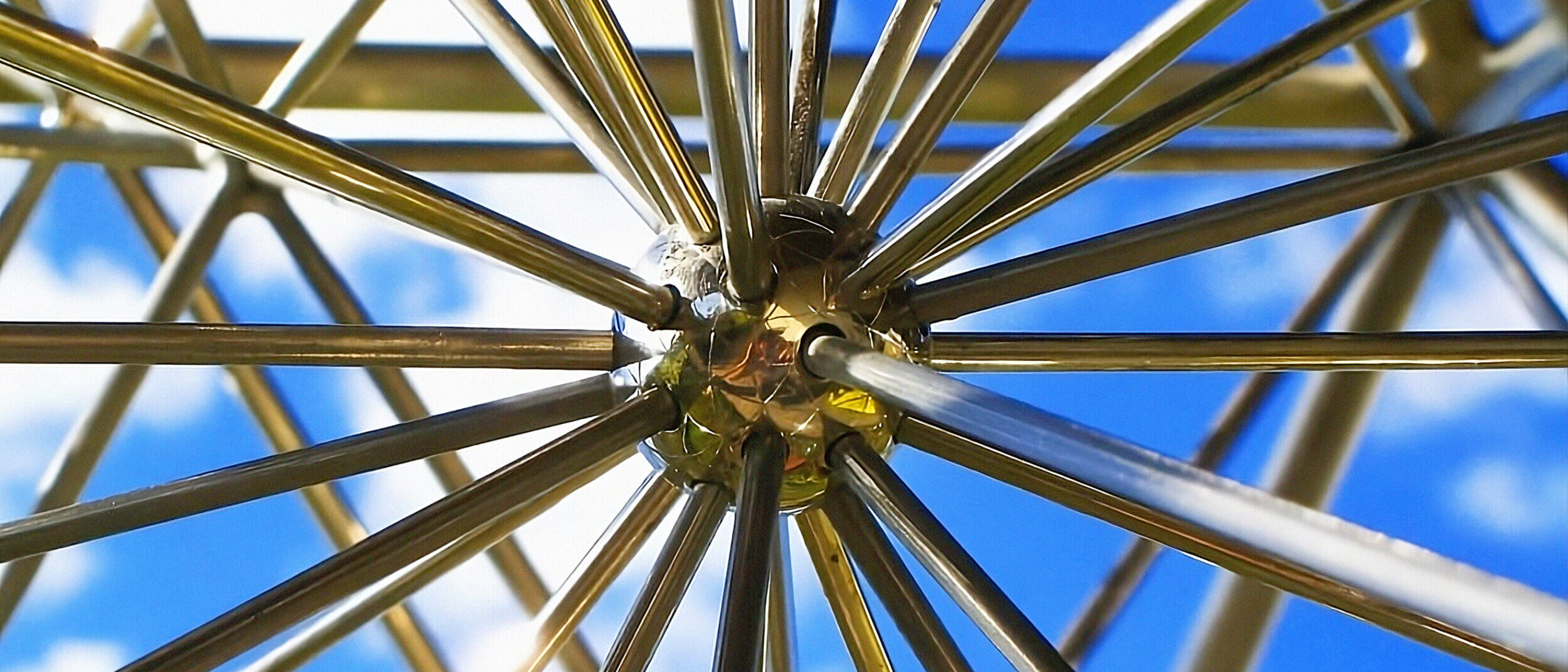 Celestial Convergence by KAGE: Close up Intricate metal sculpture by KAGE demonstrating principles of sacred geometry.